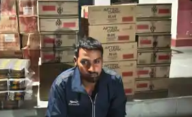 Police seizing illegal liquor stock from pickup vehicle in Bhojpur Bihar.