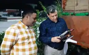 Excise department team seizing foreign liquor hidden inside truck in Muzaffarpur Bihar.