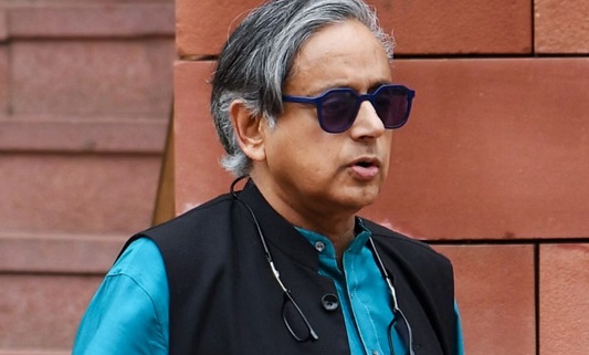 Congress MP Shashi Tharoor refuses to accept Veer Savarkar award, controversy erupts.